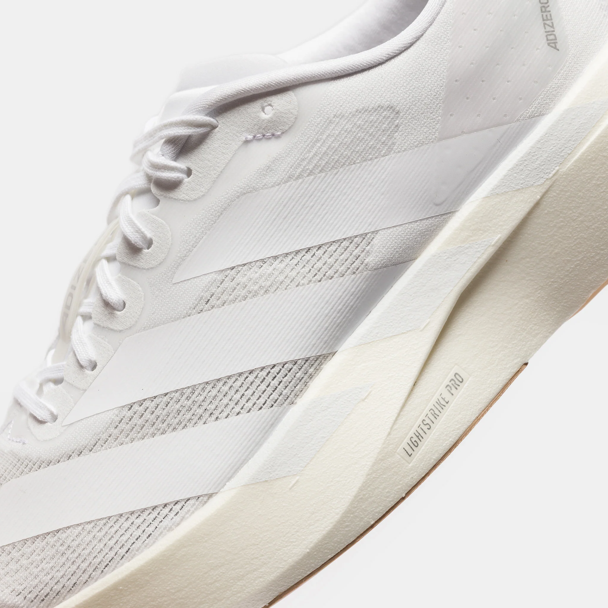 Adizero Evo SL Sneaker in White/White/Sandstone - Image 5