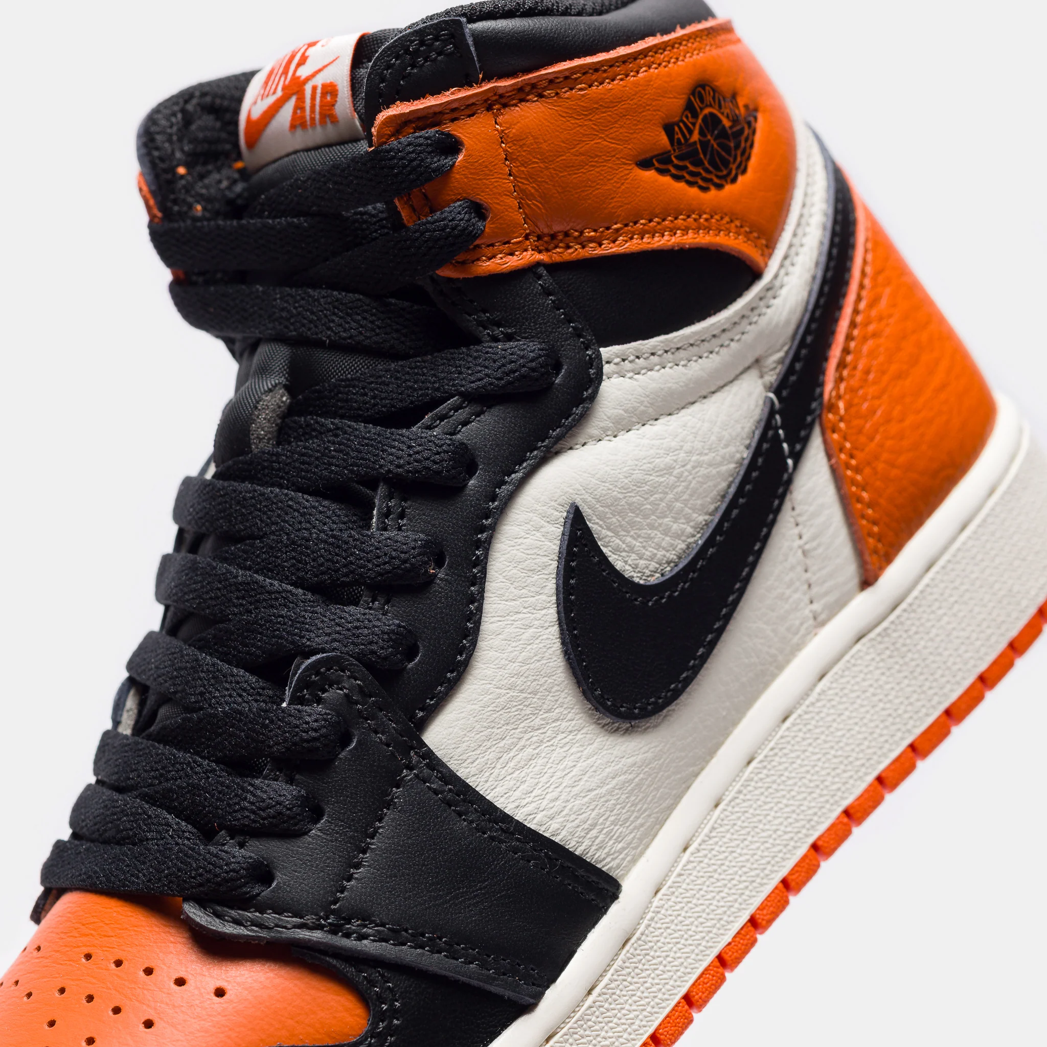 Jordan 1 Retro High OG Grade School Sneaker in Black/Black/Sail/Starfish - Image 6