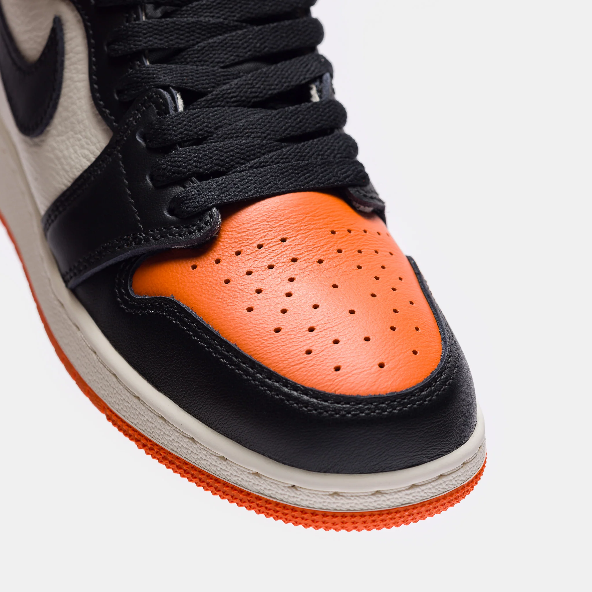 Jordan 1 Retro High OG Grade School Sneaker in Black/Black/Sail/Starfish - Image 7